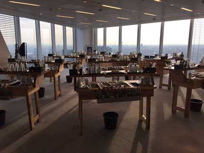 Cocktail class bars set out in a large room in the Broadgate Tower looking over London